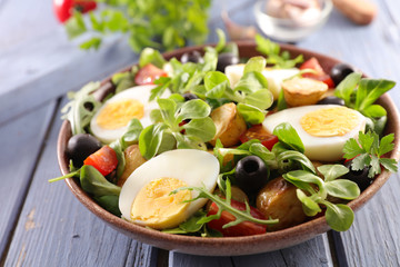 vegetable salad with egg, potato,tomato and olive