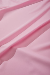close up view of pink soft wavy fabric