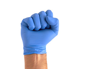 Fist wearing a bluge medical glove