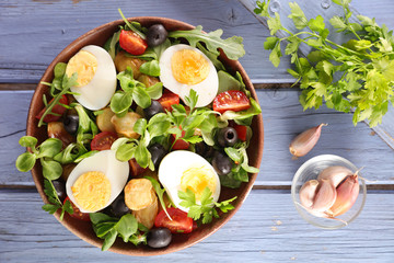 vegetable salad with egg, potato,tomato and olive