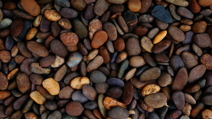 brown stone background pebbles on the beach