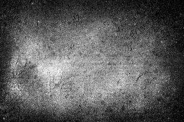 Abstract black& white monochrome distressed stone texture grunge effect background stock photo with vignette