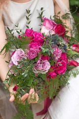 wedding purple boho bouquet in bride's hands