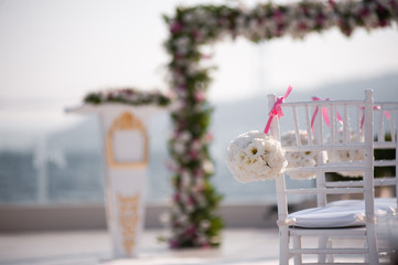 beautiful Wedding setting with sunny day. Beautiful wedding flower decorations. Wedding Set up