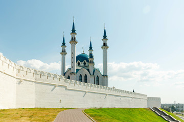 Muslim mosque with a Crescent on the spire, a historic landmark, the minaret on the background of sky