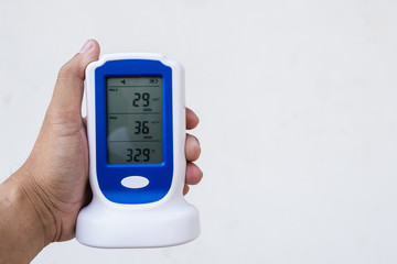 Measurement dust PM 2.5 measure In office Exceed the standard pollution environment in the work...
