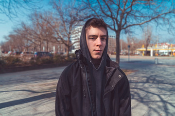 Fototapeta premium portrait of a serious young man with hoodie