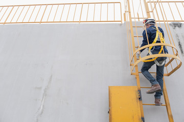 Technician Wear seat belts Safety harness Going up the stairs fixed ladder Working on a high ground In industrial plants prevent Fall from a height Wear protective equipment With space to enter text