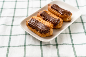 cakes chocolate icing tablecloth cage background