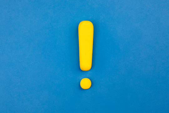 Vivid exclamation mark on blue background. Warning, keep attention concept.t
