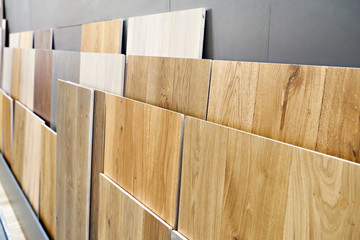 Naklejka na ściany i meble Samples of wooden panels in store