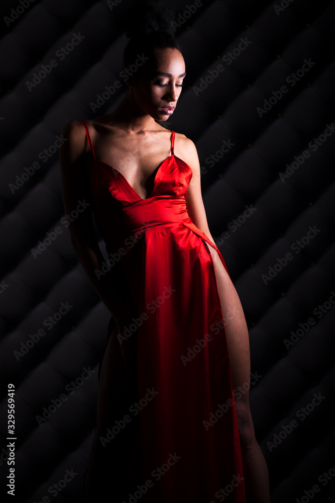 Canvas Prints Portrait of sensual young african woman in red dress