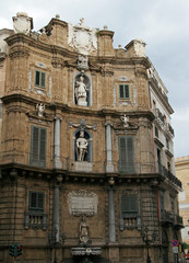 Fototapeta na wymiar Facade of old building in Old town of Palermo, Sicily, Italy