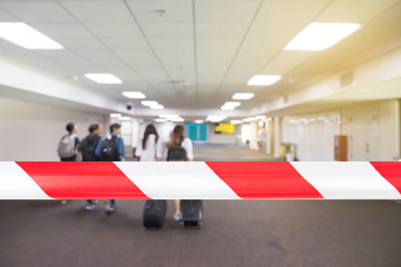 Covid-19 corona virus outbreak concept.Airport security forbidden sick tourist at airport terminal for security check prevent corona virus epidemic