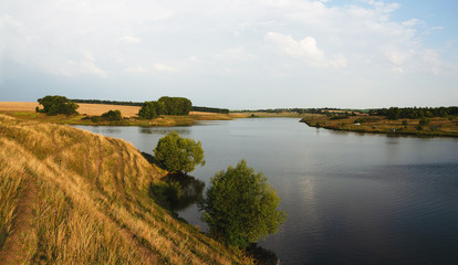 Obraz premium sunset over the river