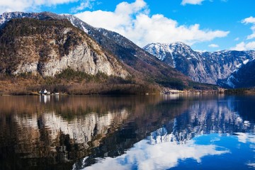 Winter sunny morning on lake Hallstatt. The most beautiful lake to explore in Austria. Salzkammergut, Austrian Alps.