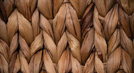 background of textured dry wicker grass close up