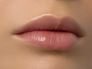 Closeup plump Lips. Lip Care, Augmentation, Fillers. Macro photo with Face detail. Natural shape with perfect contour. Close-up perfect natural lip makeup beautiful female mouth. Plump sexy full lips - obrazy, fototapety, plakaty