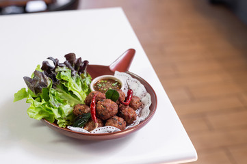 Thai deep fried minced pork and herb balls