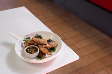 Fried chicken wings with fish sauce