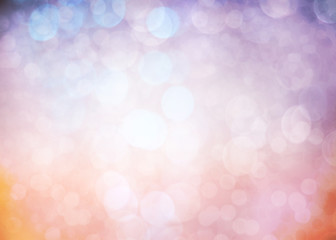 abstract  bokeh background with glitter lights and gradient sunset colors