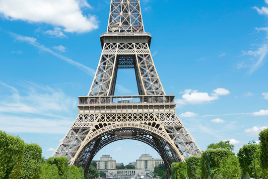 Eiffel Tower, symbol of Paris, in a beautiful summer day with blue sky - Powered by Adobe