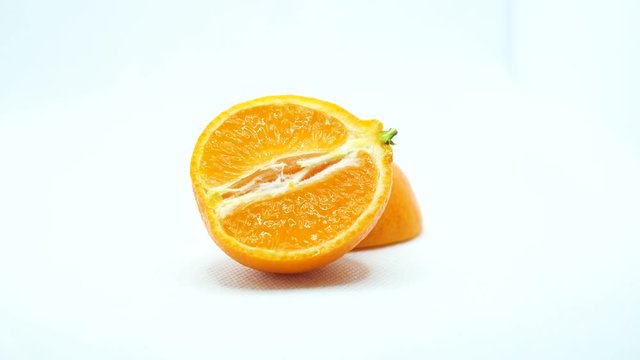 Rotating around fresh sliced orange
