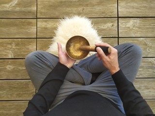 Man with a tibetan bowl