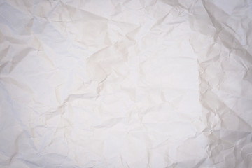 wrinkled white paper folio