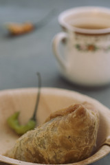 indian snack samosa and tea