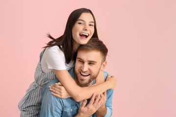 Fototapeta premium Happy friends on color background