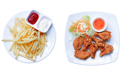 French fries and chicken salad on white dish with isolated