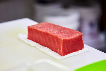 Steak of  Tuna Fish Fillet on a cutting board - Fish and Seafood