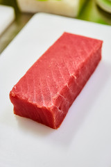 Steak of  Tuna Fish Fillet on a cutting board - Fish and Seafood