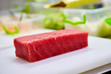 Steak of  Tuna Fish Fillet on a cutting board - Fish and Seafood © bondvit