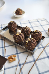vegetarian raw materials healthy diet without baking candy balls dessert sweets gluten-free sugar free with coconut, proper nutrition snack on a white background