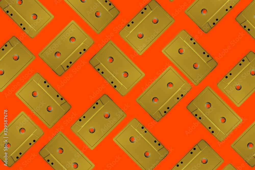 Poster beautiful gold magnetic cassette tapes flat background pattern for design. creative concept of retro