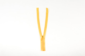 yellow zipper on white background