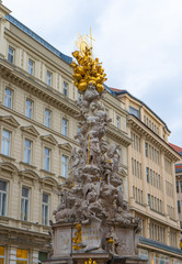 Fototapeta na wymiar The Plague Column (1694) or Trinity Column (Dreifaltigkeitssaule), a Holy Trinity column located on the Graben, a street in the inner city of Vienna, Wien, Austria.
