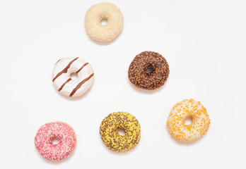 Fototapeta na wymiar Delicious donuts on white color background.
