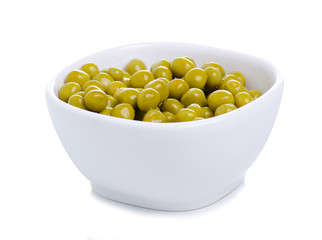 White bowl with canned green pea on white background isolation