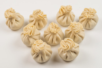 Khinkali on white background.