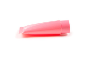 Pink plastic bottles for hygiene products, cosmetics, hygiene products on a white background. Copy space.
