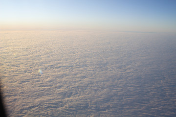 Fototapeta na wymiar Wide cloud landscape aerial view from a plane