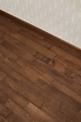 Natural wooden texture. New oak parquet. Wooden laminate floor boards background image. Polished oak pattern.