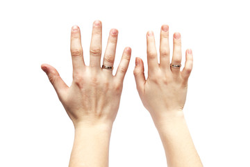 Hands on a white background. Male and female hand on a white background. Rings on the hands.