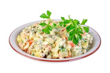 The vinaigrette of various boiled vegetables in the plate on white