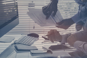 Project management, business people working in office, closeup of hands. Consulting concept.