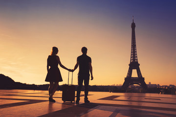 silhouette of couple of tourists in Paris, romantic getaway travel in France