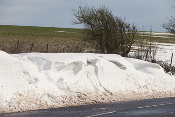 Snow and Snowdrifts on a road near Upwey